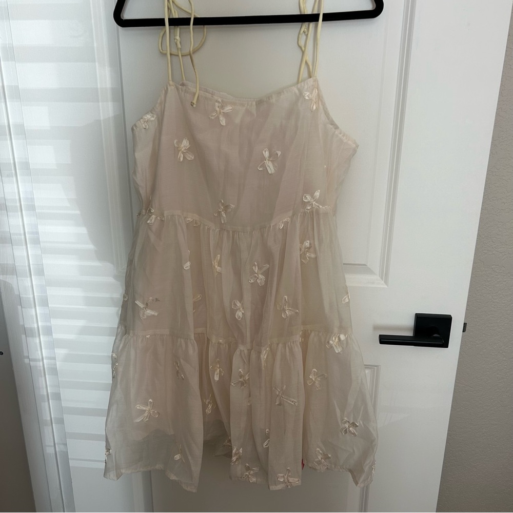 Cream Sleeveless Dress with Flower Details